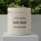 Jar of 'Dark Rose' body butter cream with 'Birch Beauty' branding on a light surface with greenery in the background.
